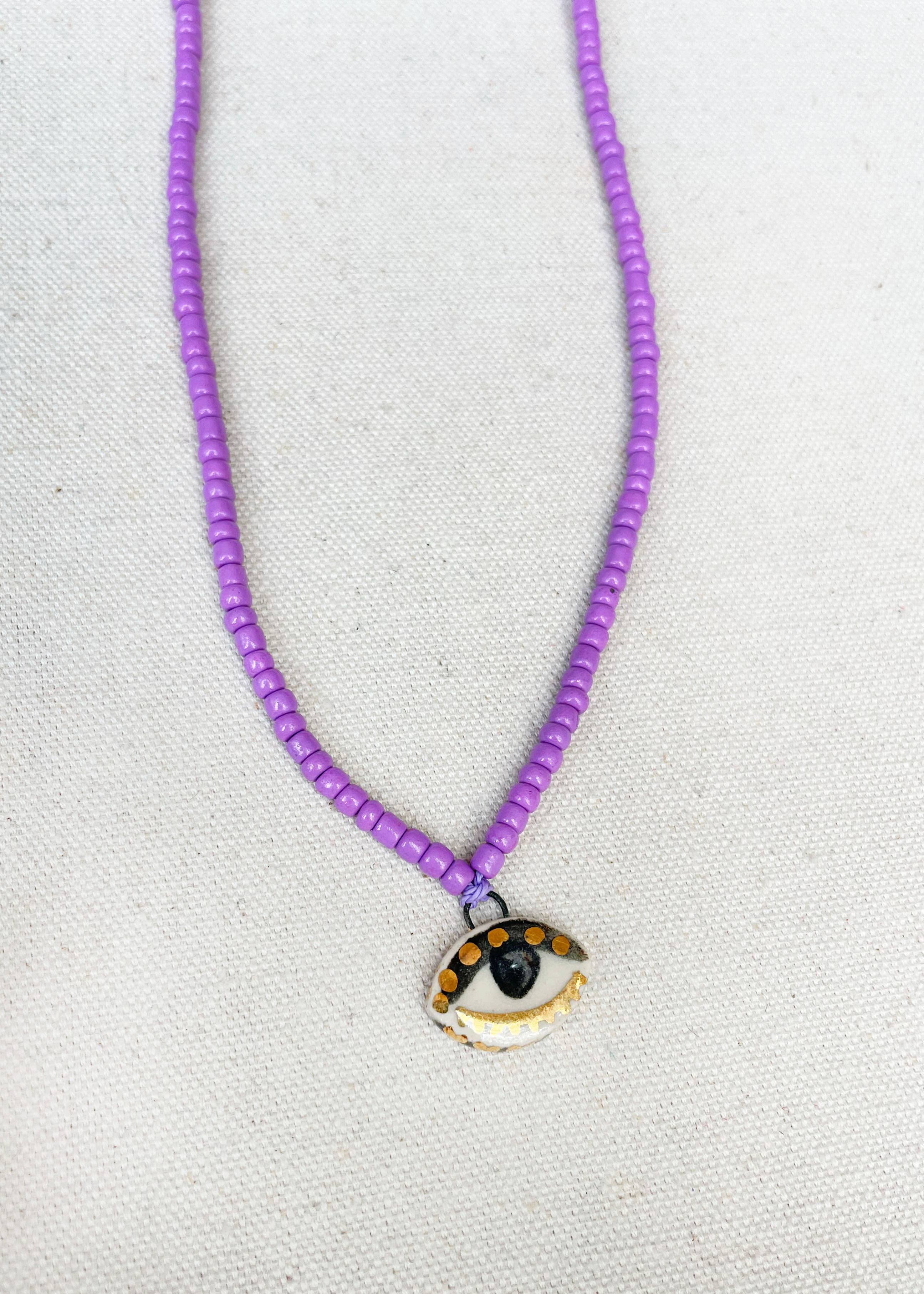 Not so evil eye charm beaded necklace