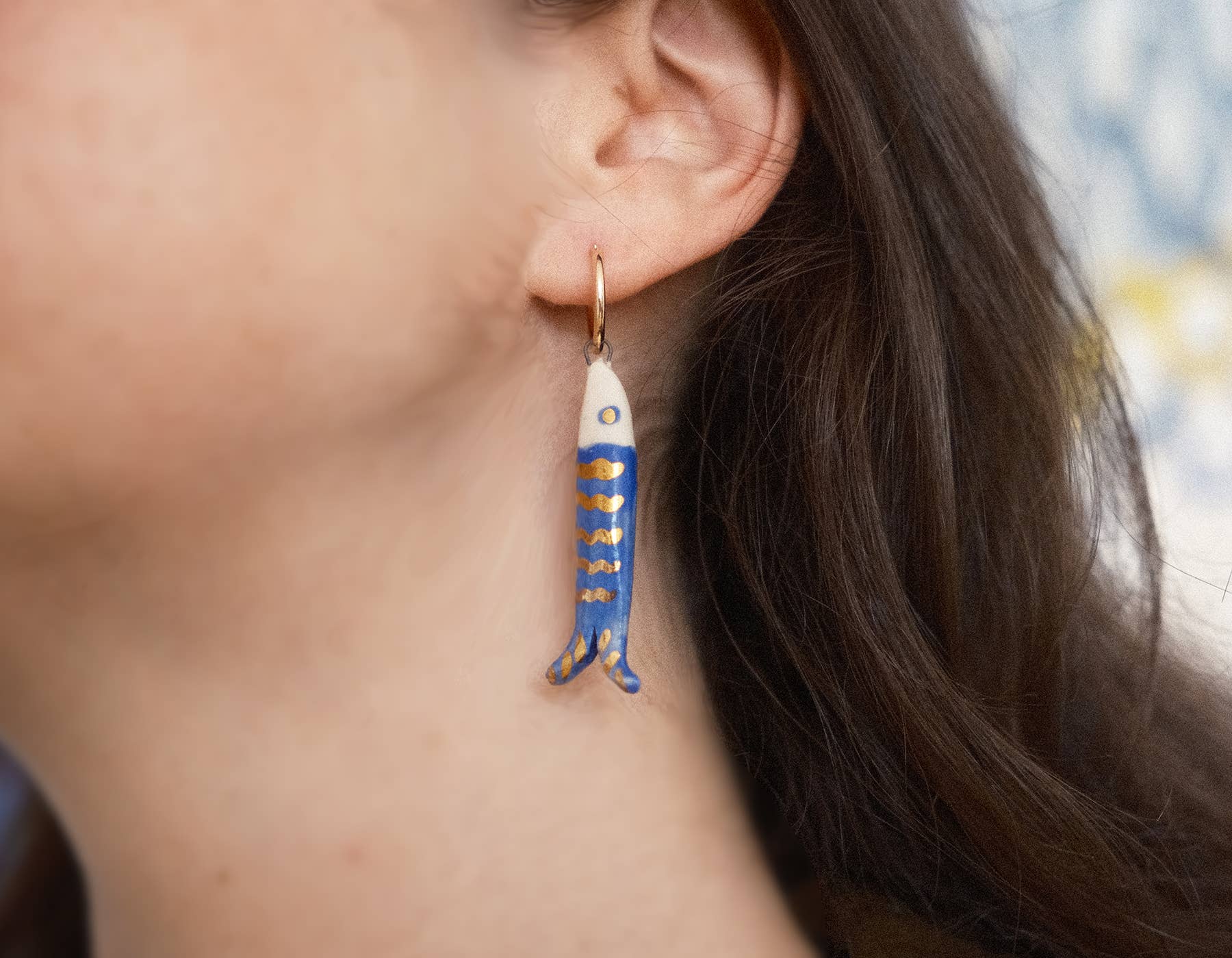 Mismatched Catch earrings (fish and eye)