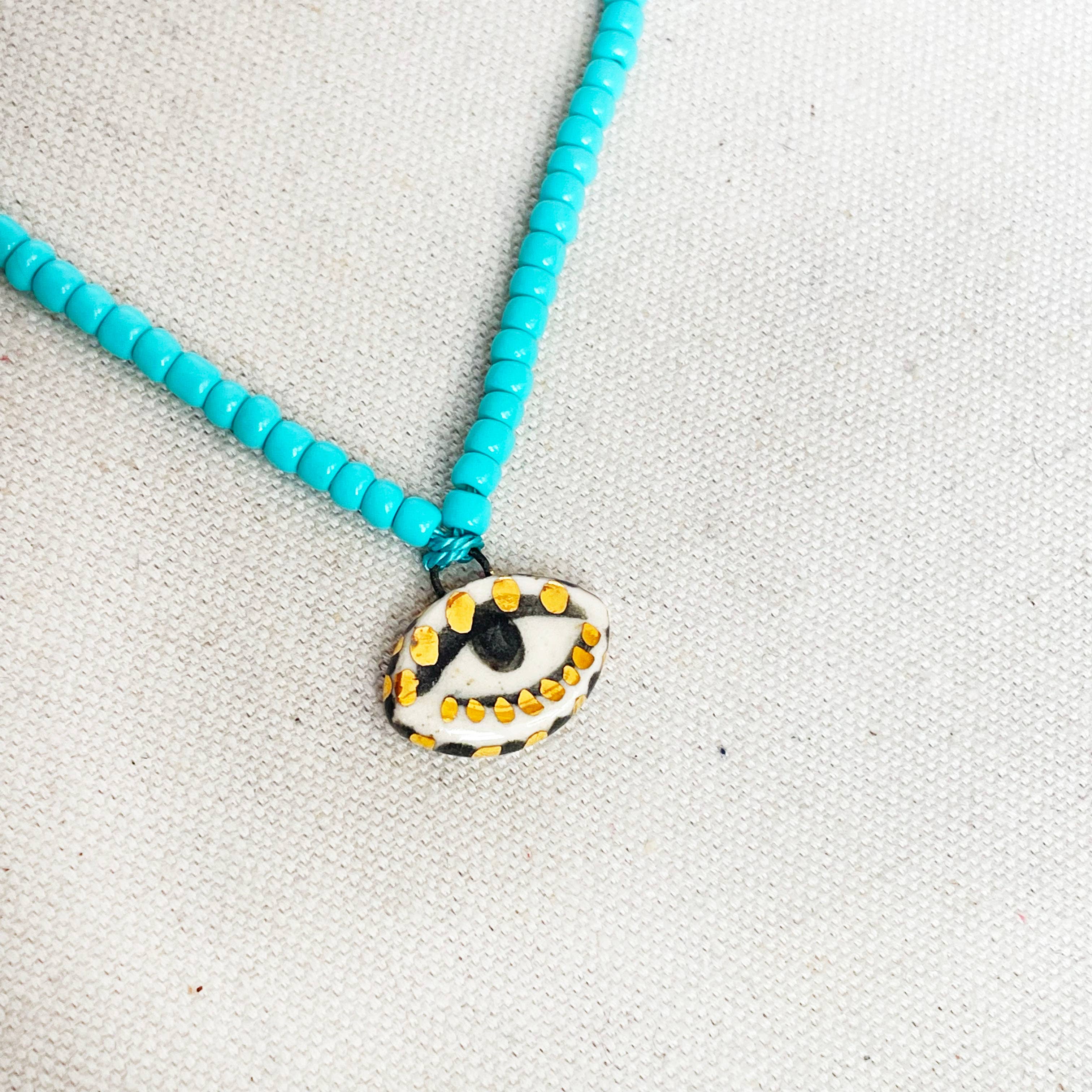 Not so evil eye charm beaded necklace