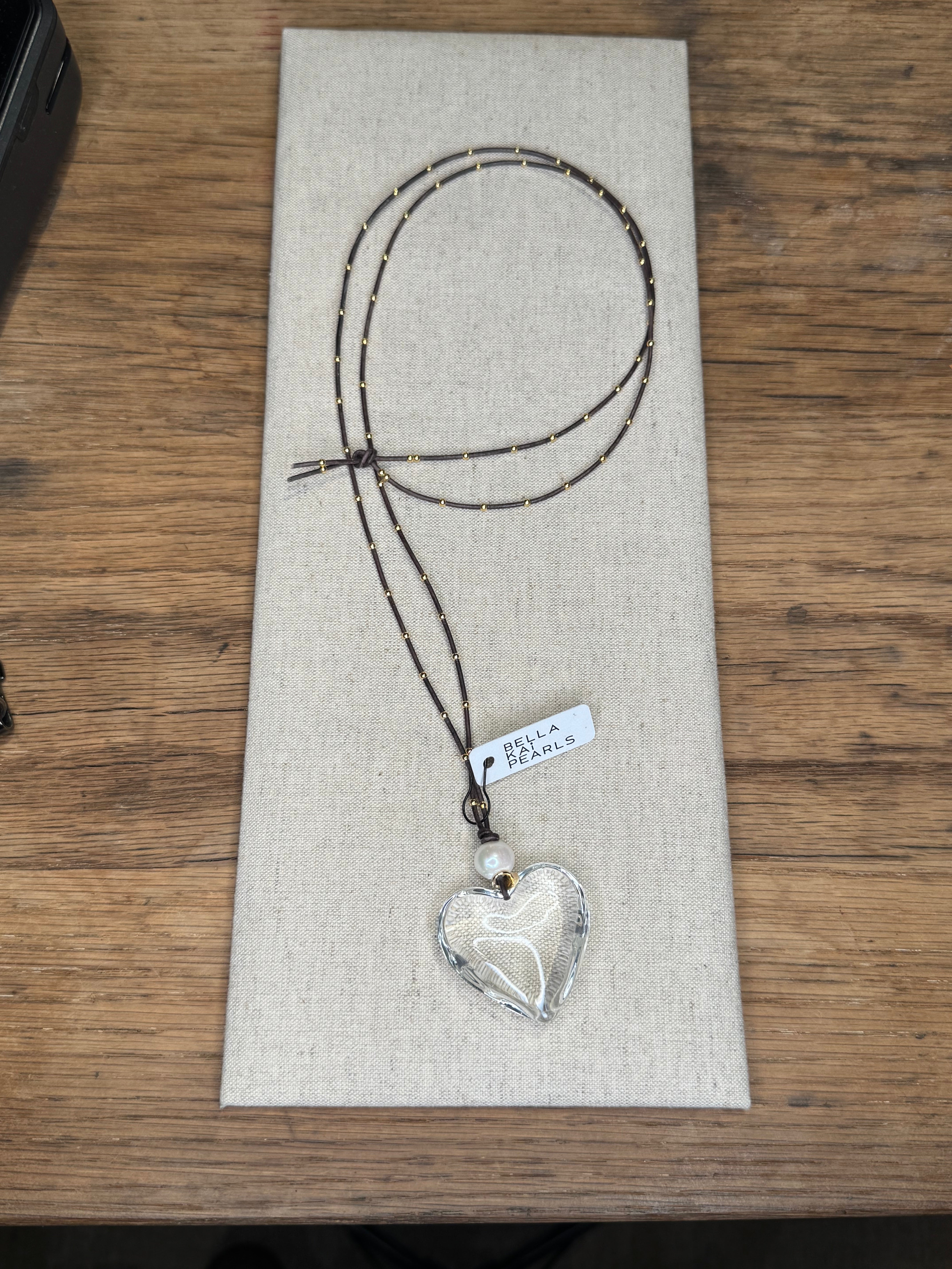 Long studded leather with glass heart