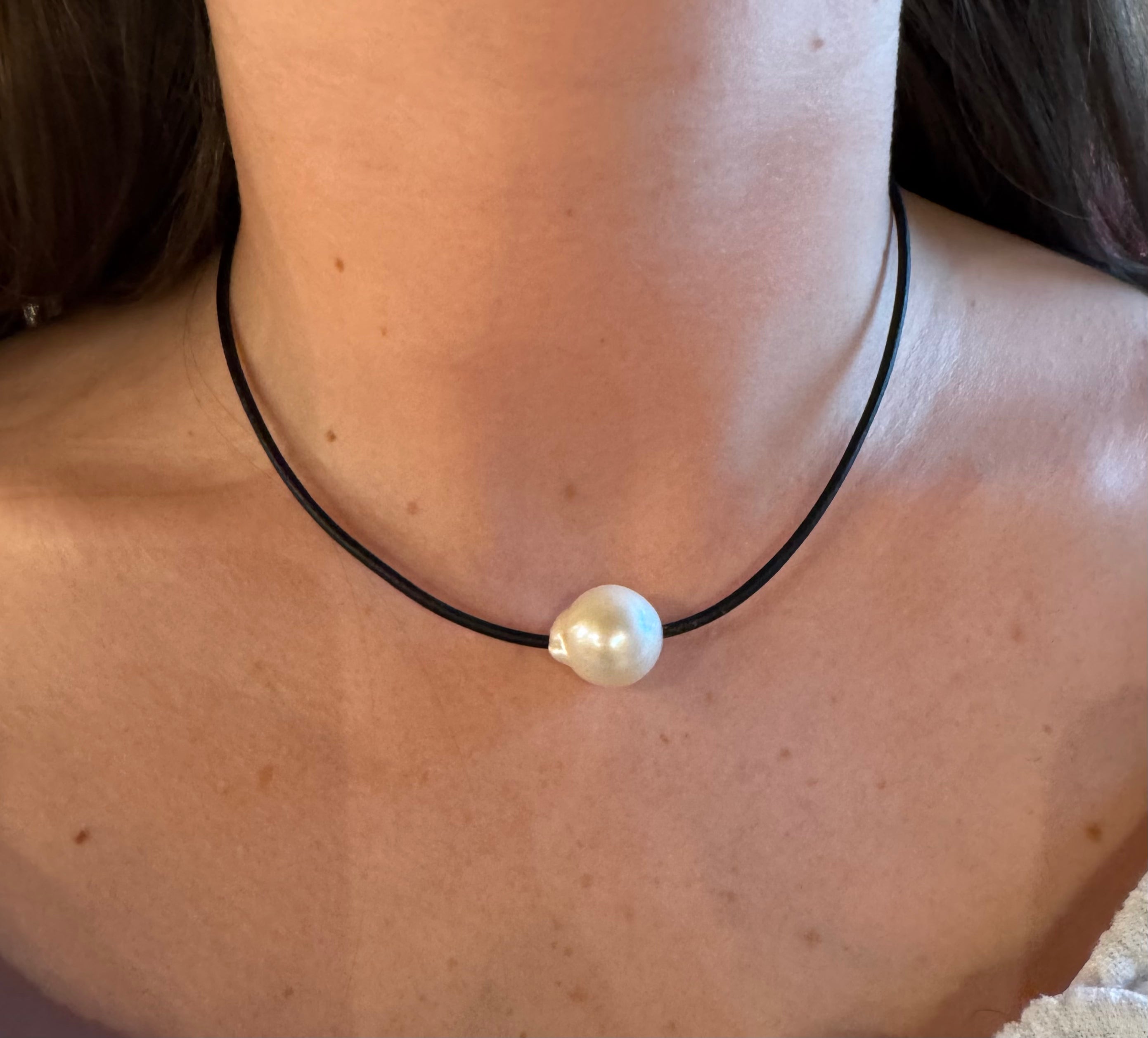 Big White Pearl Slider on Black Leather