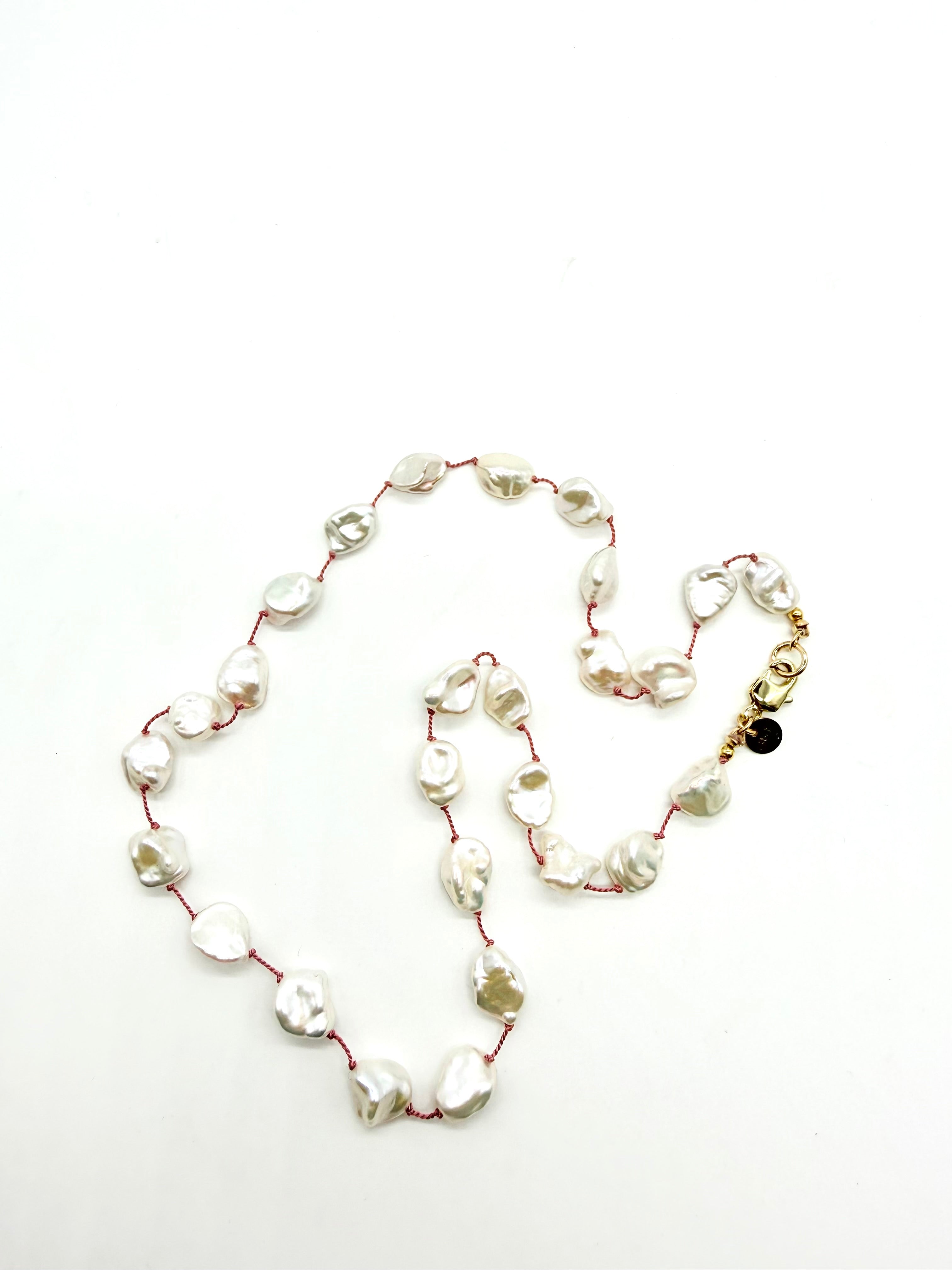 Floating Keshi on Pink Silk