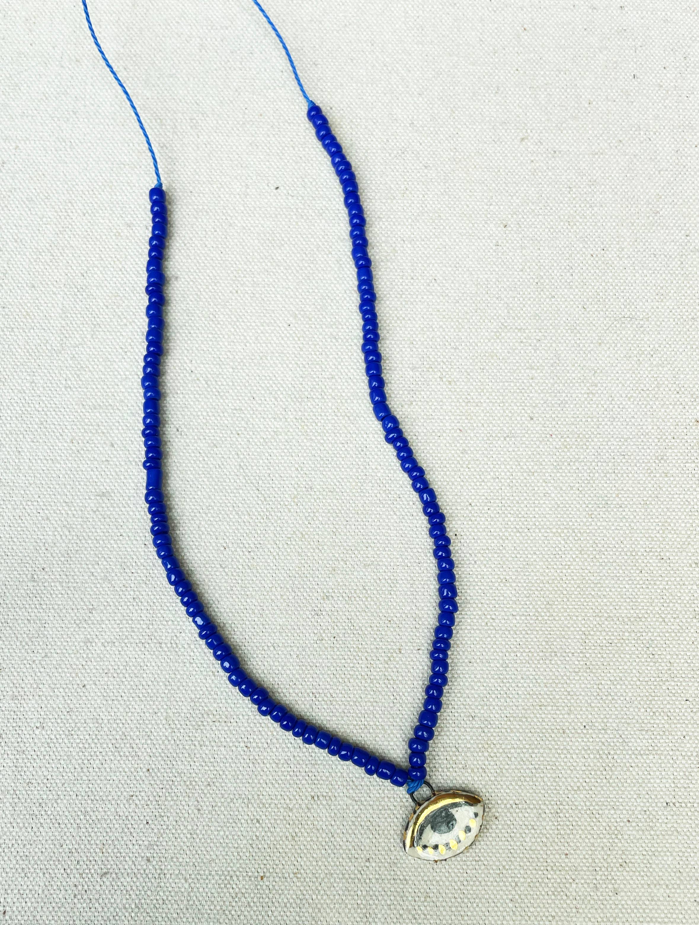 Not so evil eye charm beaded necklace