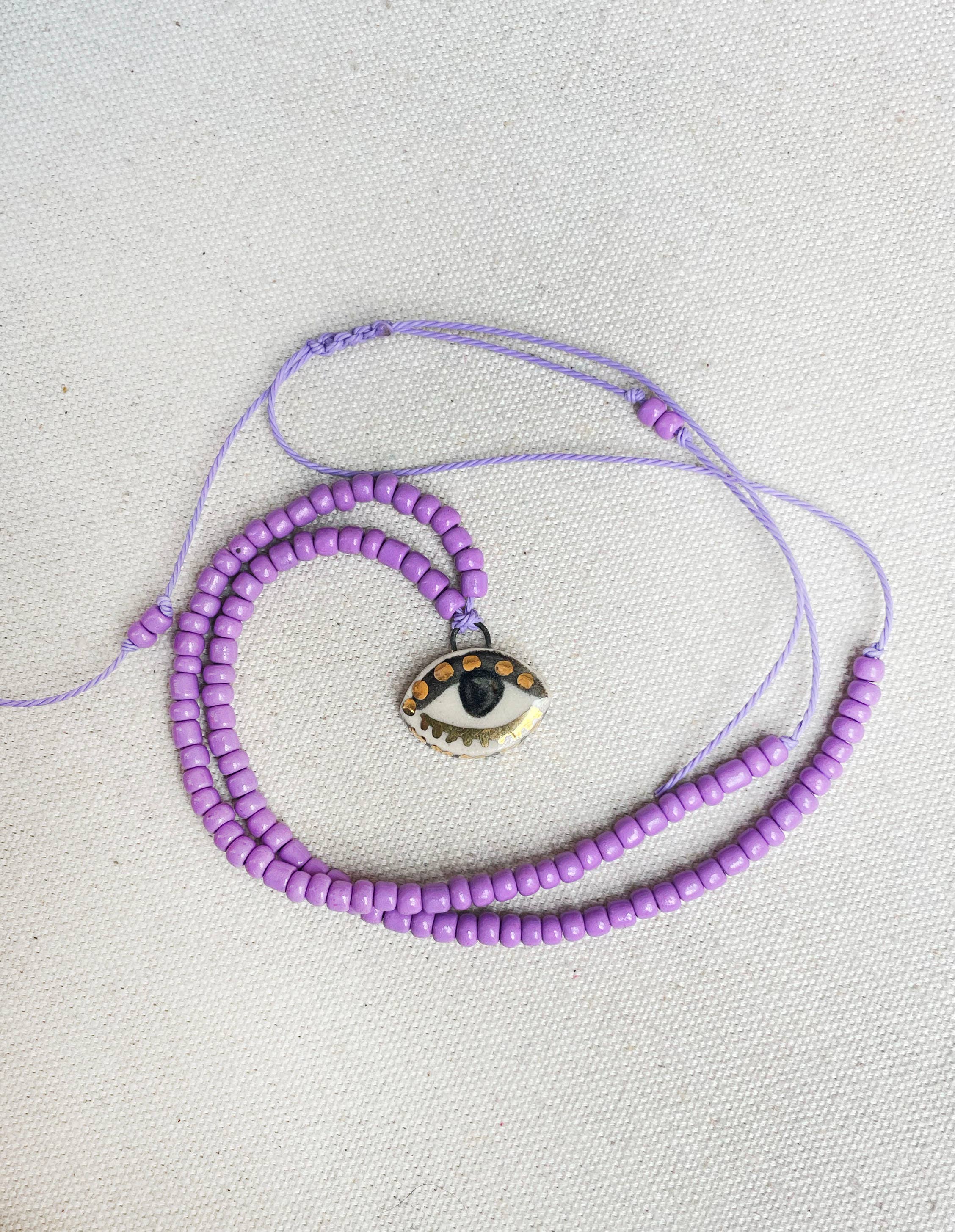 Not so evil eye charm beaded necklace