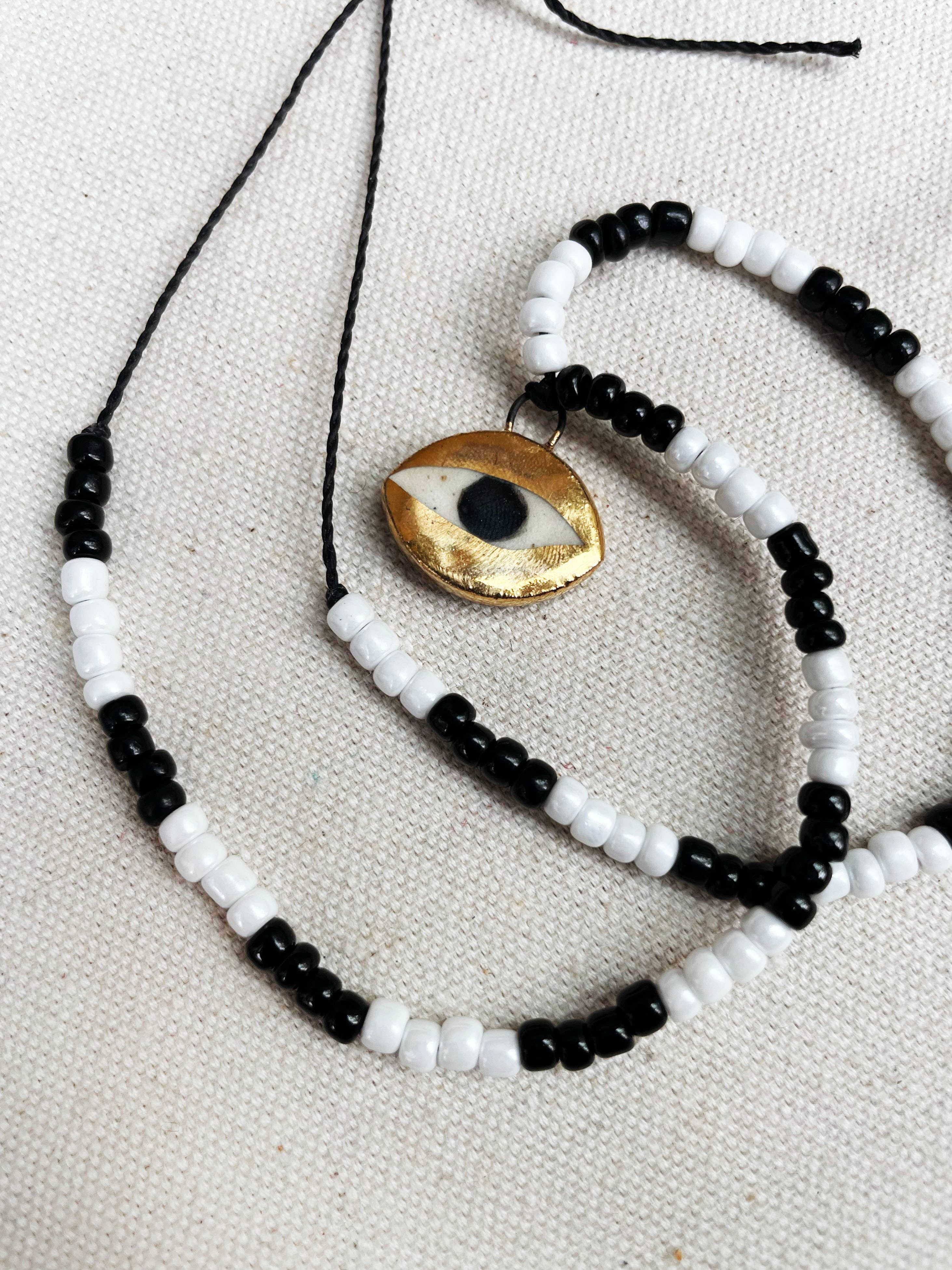 Not so evil eye charm beaded necklace
