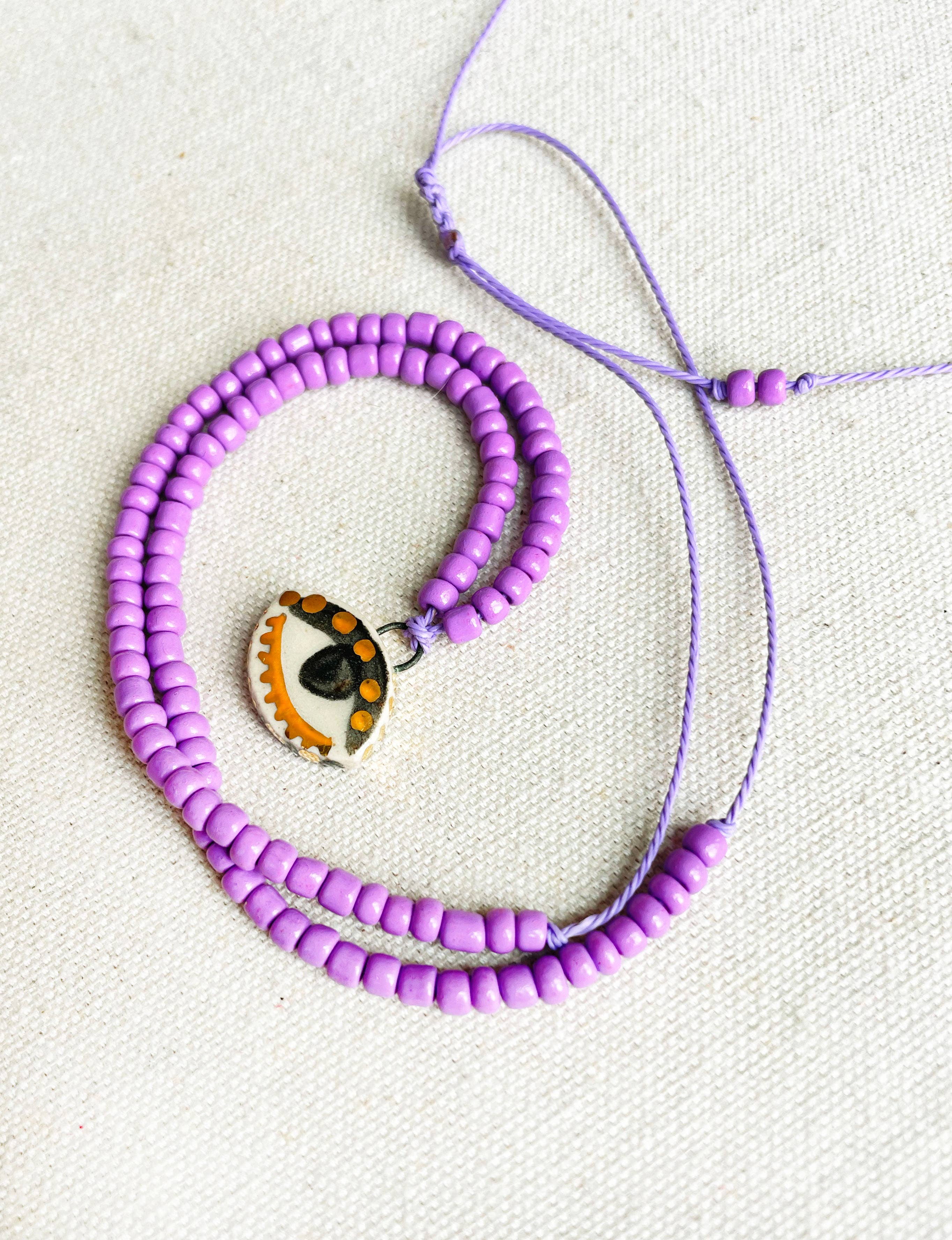 Not so evil eye charm beaded necklace