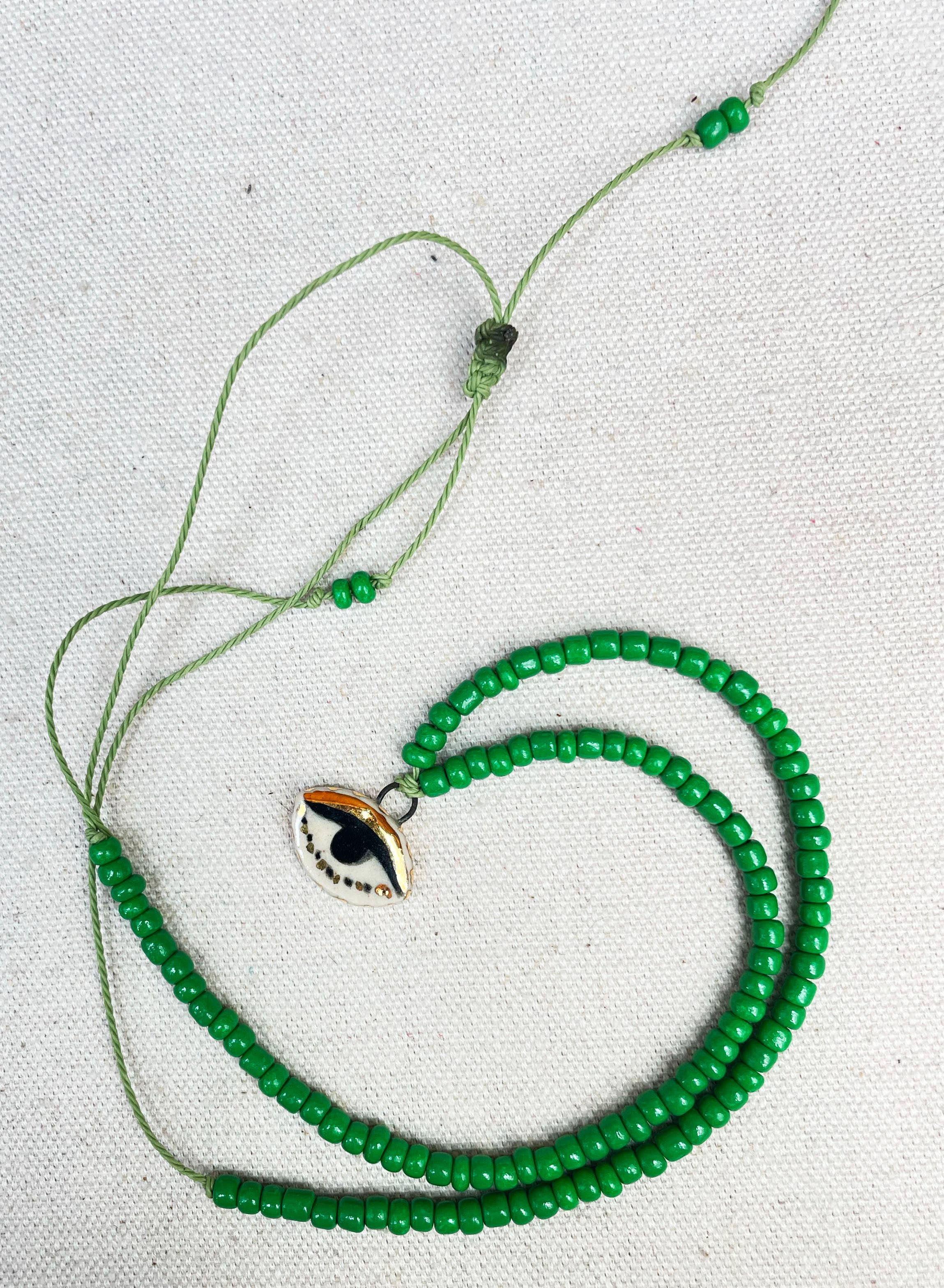 Not so evil eye charm beaded necklace
