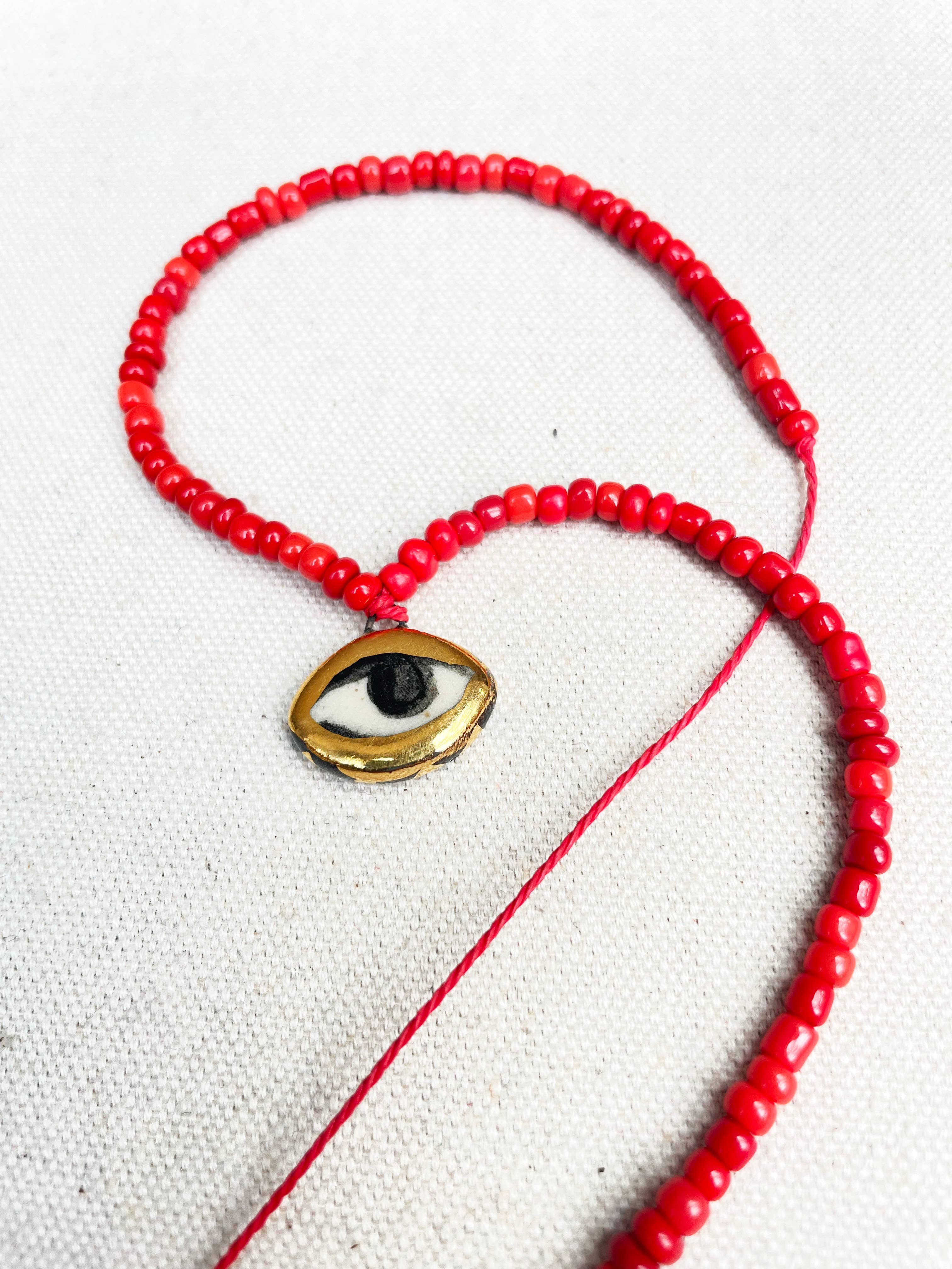 Not so evil eye charm beaded necklace
