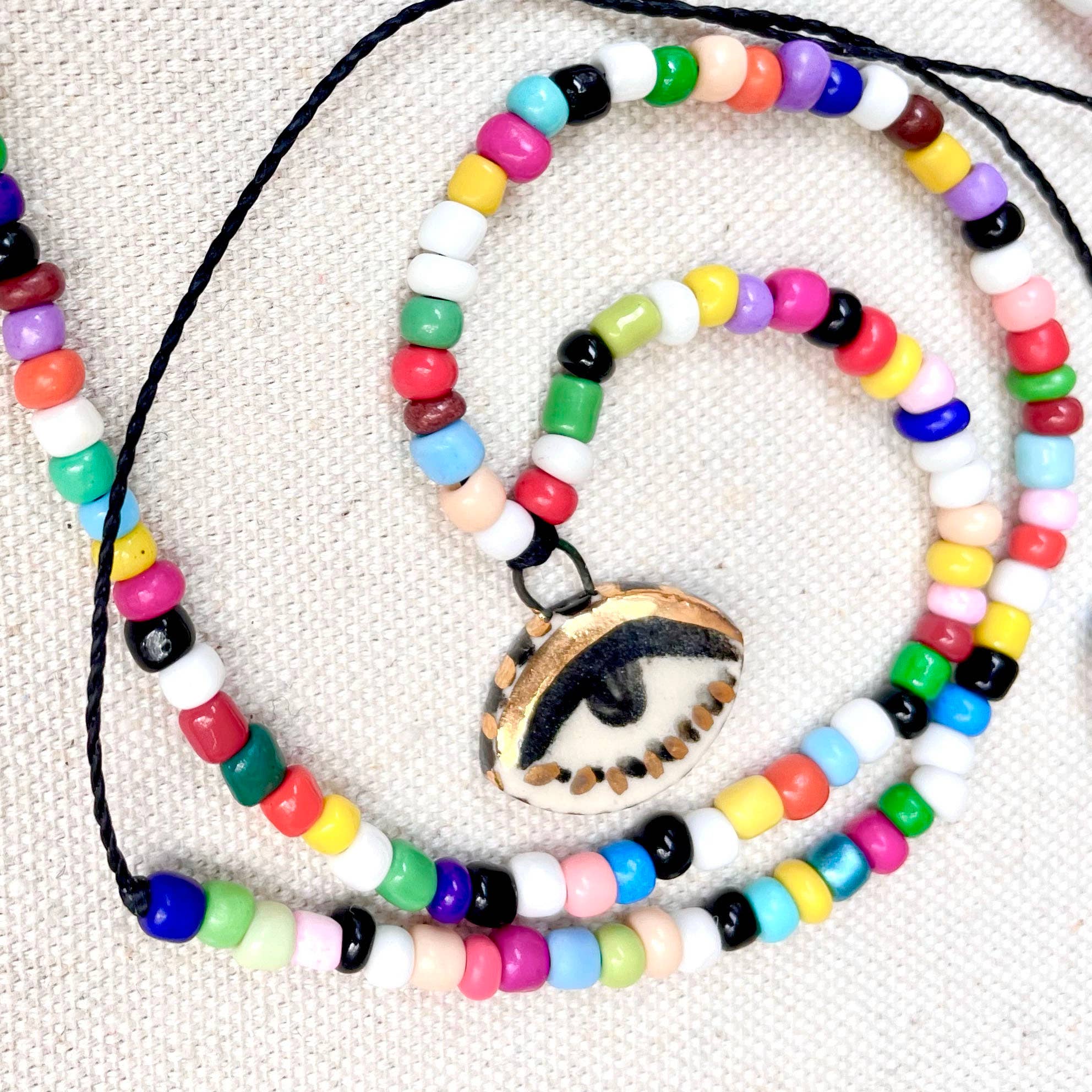 Not so evil eye charm beaded necklace